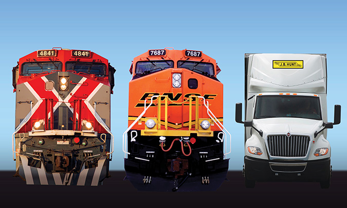 From left to right: GMXT locomotive, BNSF locomotive and J.B. Hunt truck. From left to right: GMXT locomotive, BNSF locomotive and J.B. Hunt truck.