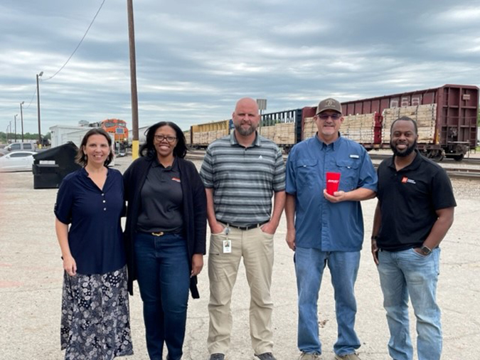 Members of the Red River Diversity Council join together for volunteer work. 