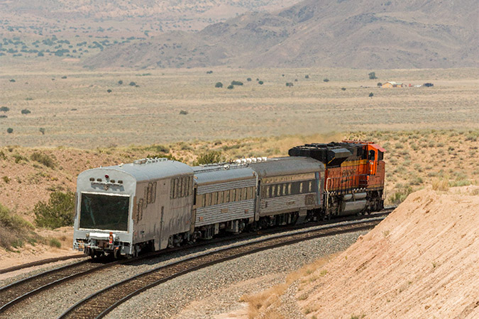 An observation window at the rear of the train is part of the manned geo car design.