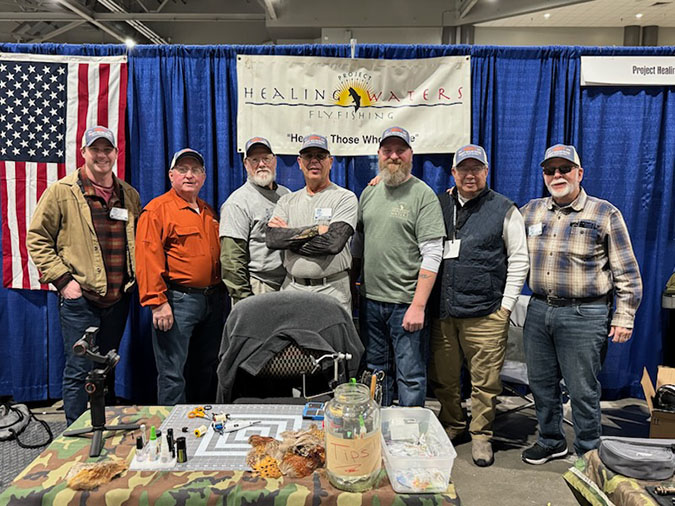 Daprato, center, and other members of the Healing Waters group from Topeka 