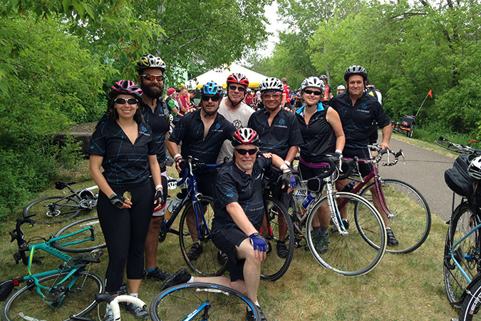Fisher with other railroaders at the MS150 cycling ride. From left -- Maria Morgan, Jonathan Morgan, Fisher, Roger McGowan, Tu Tran, Carla Jacobson, Phil Peters, and in the Front Mark Duell Fisher with other railroaders at the MS150 cycling ride. From left -- Maria Morgan, Jonathan Morgan, Fisher, Roger McGowan, Tu Tran, Carla Jacobson, Phil Peters, and in the Front Mark Duell